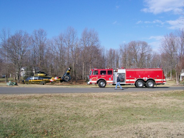 Engine 24 operates on a landing site with Trooper 7